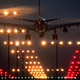 For illustration purposes, a photo of the Approach Lighting System at Los Angeles International Airport. The ALS consists of an array of lights mounted on poles high above the ground, marking a path toward the beginning of the runway.